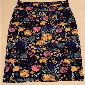 LuLaRoe knee length navy skirt floral pattern